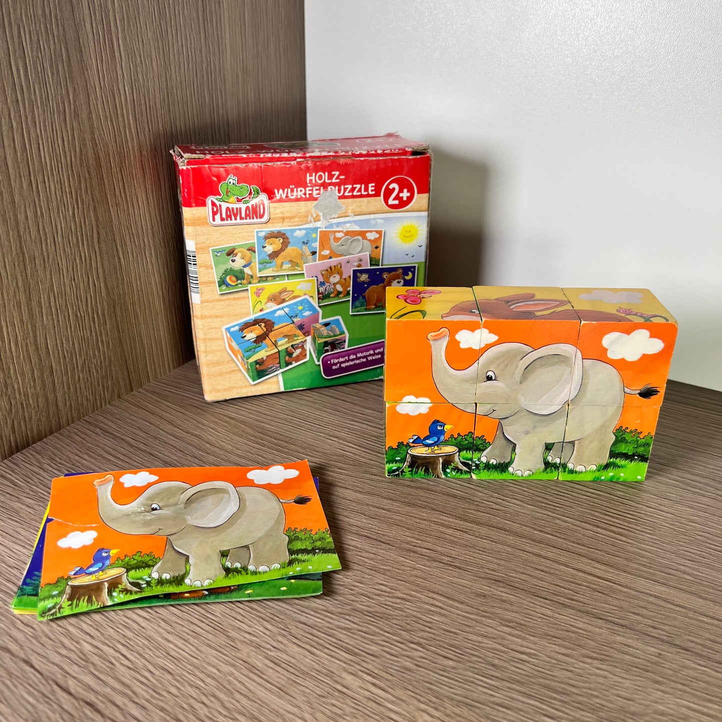 Medinės kaladėlės su paveiskliukais