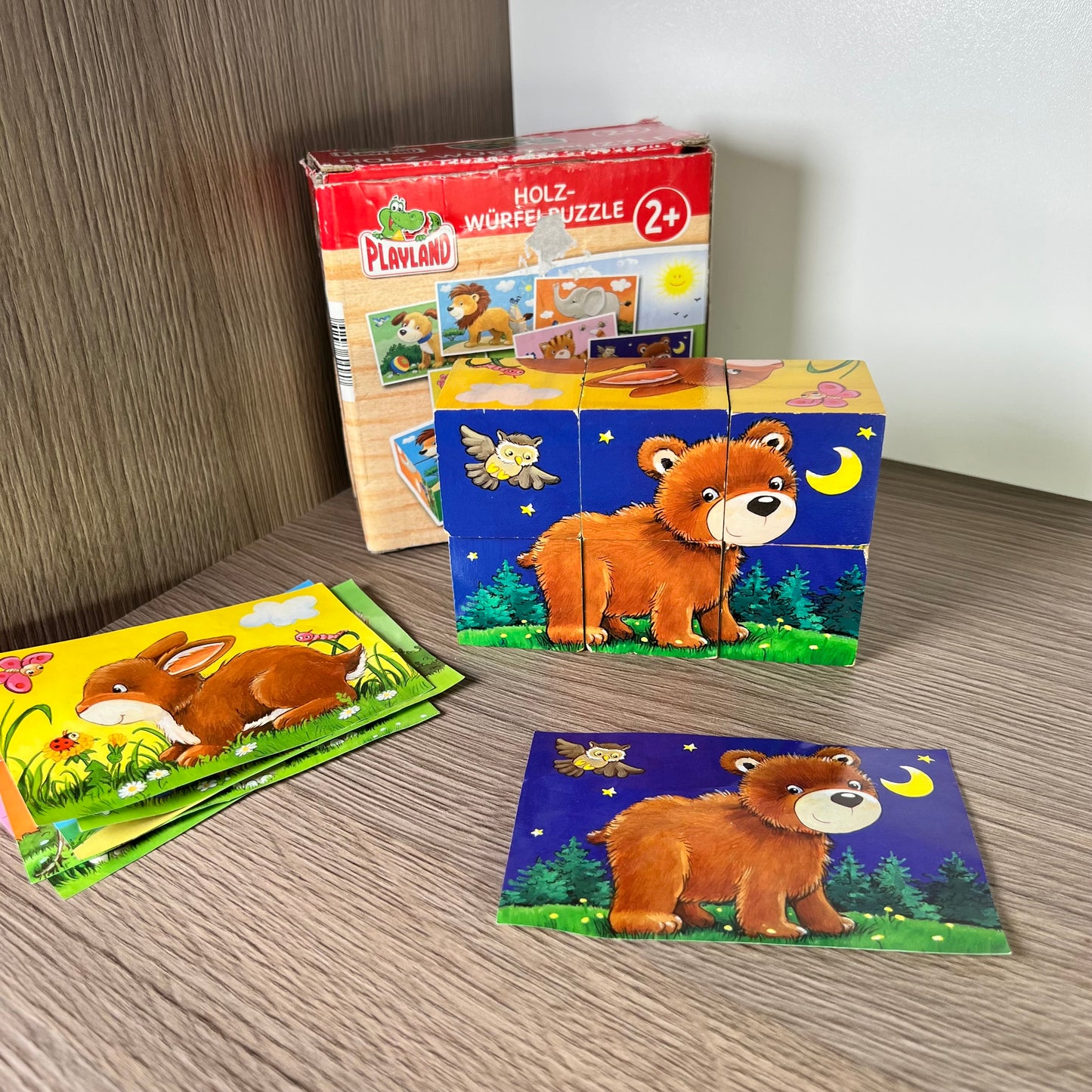 Medinės kaladėlės su paveiskliukais