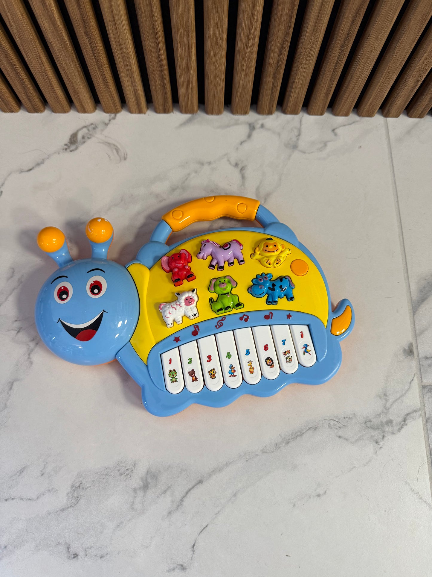 Muzikinis žaislas „Dainuojanti sraigė“ 🎶🐌