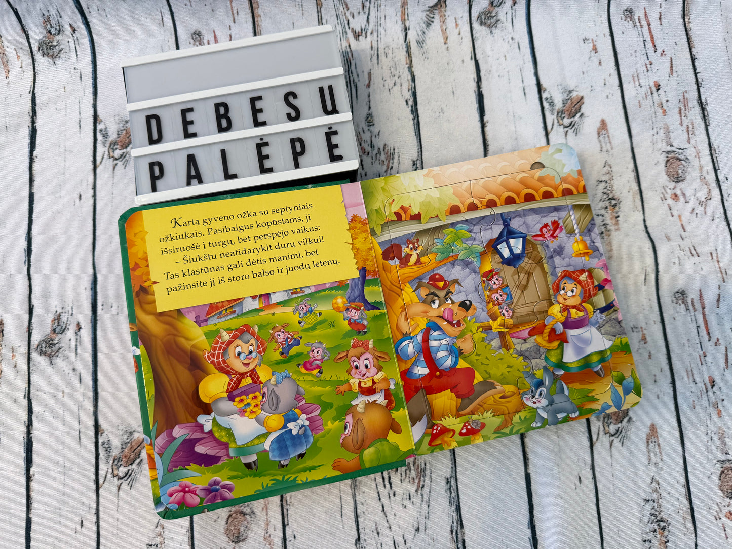 📚 Vilkas ir septyni ožiukai dėlionių knyga